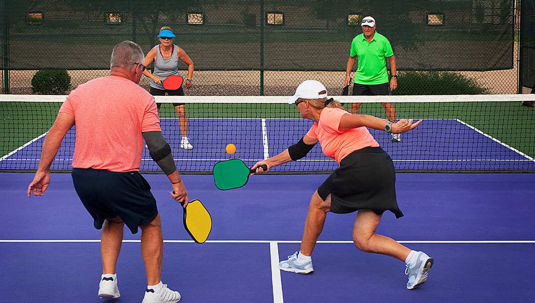 Guests playing pickleball