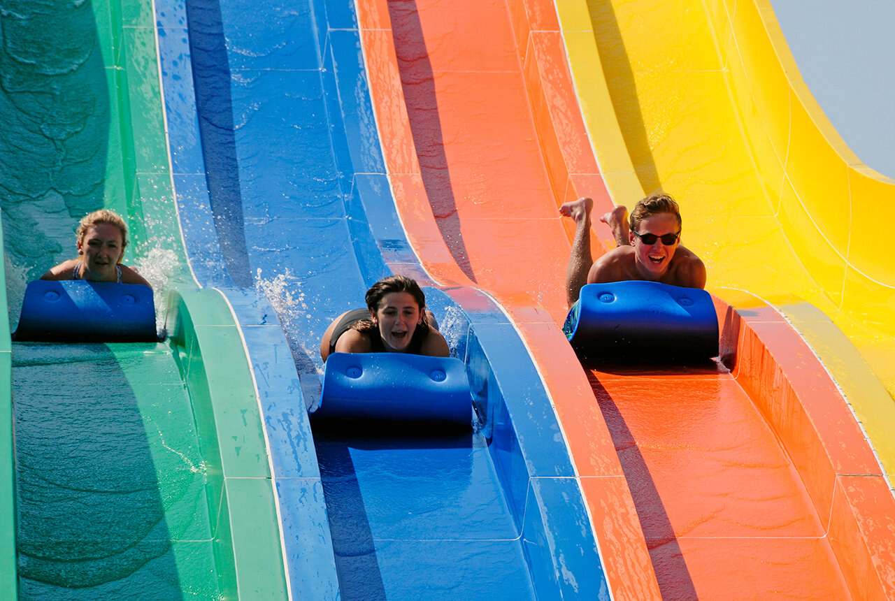 Guests on the Mat Racer at the Outdoor WaterPark