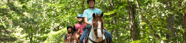 Group of people going on a horseback riding adventure