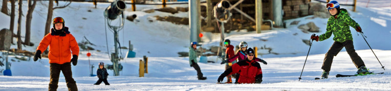 Guests enjoying snow sports at Massanutten Resort