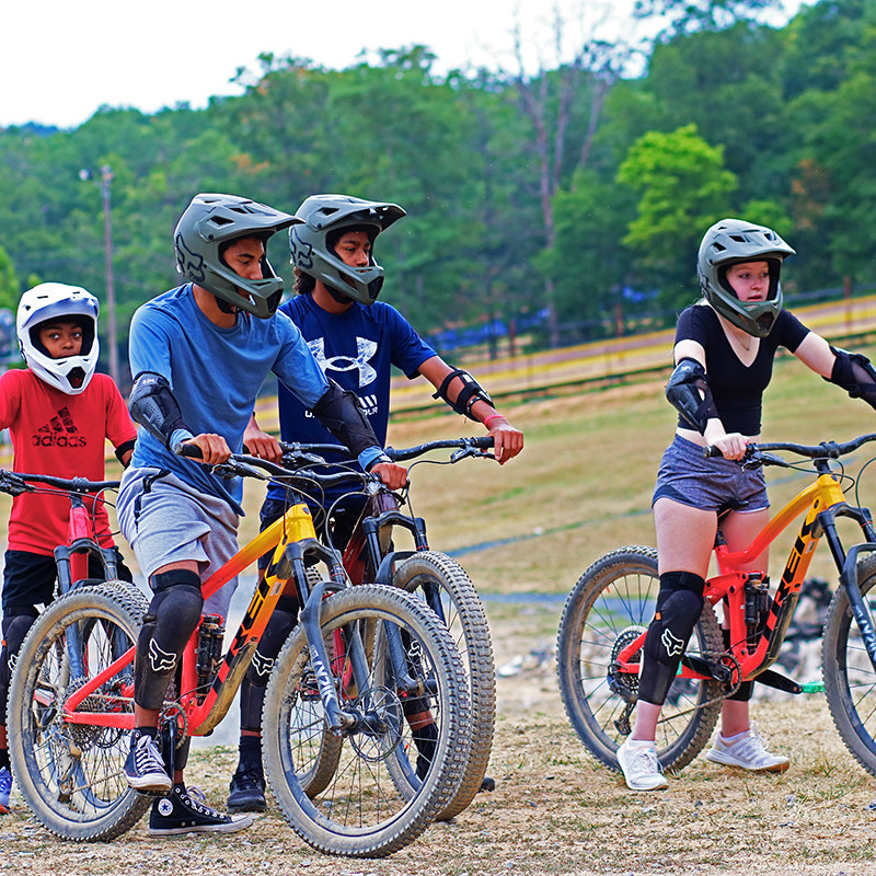 Guests attending a Pathway Package lesson at the Massanutten Bike Park