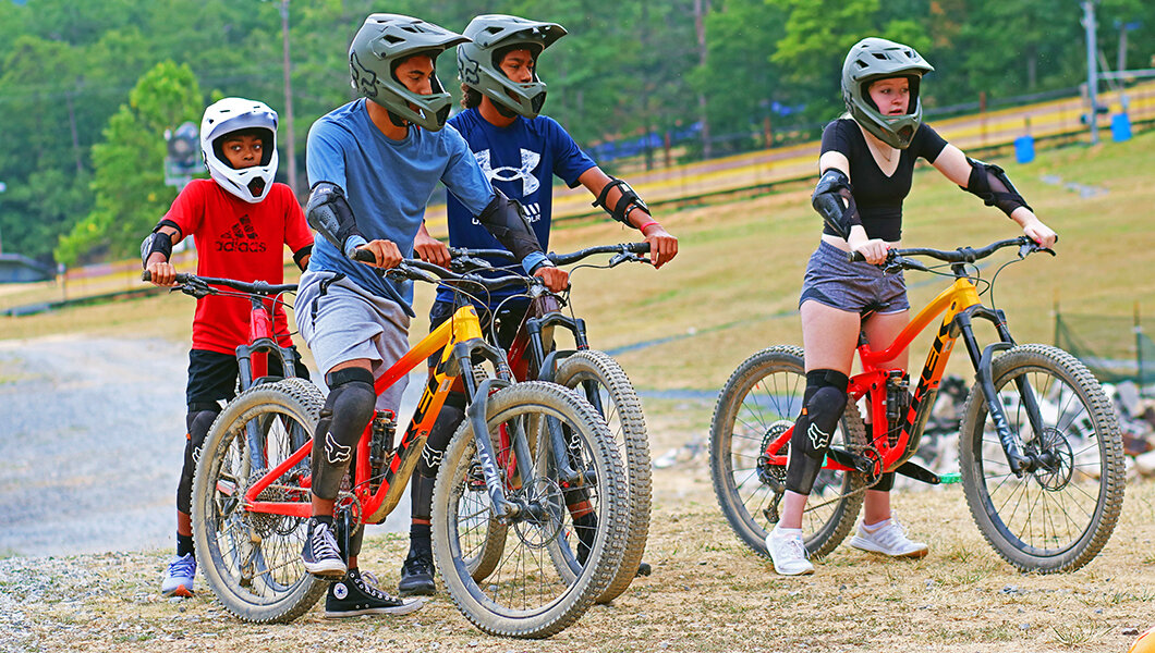 A group of guests taking a lesson at the Massanutten Mountain Bike Park