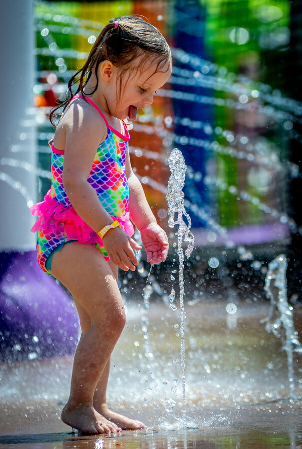 A girl playing at the Outdoor WaterPark