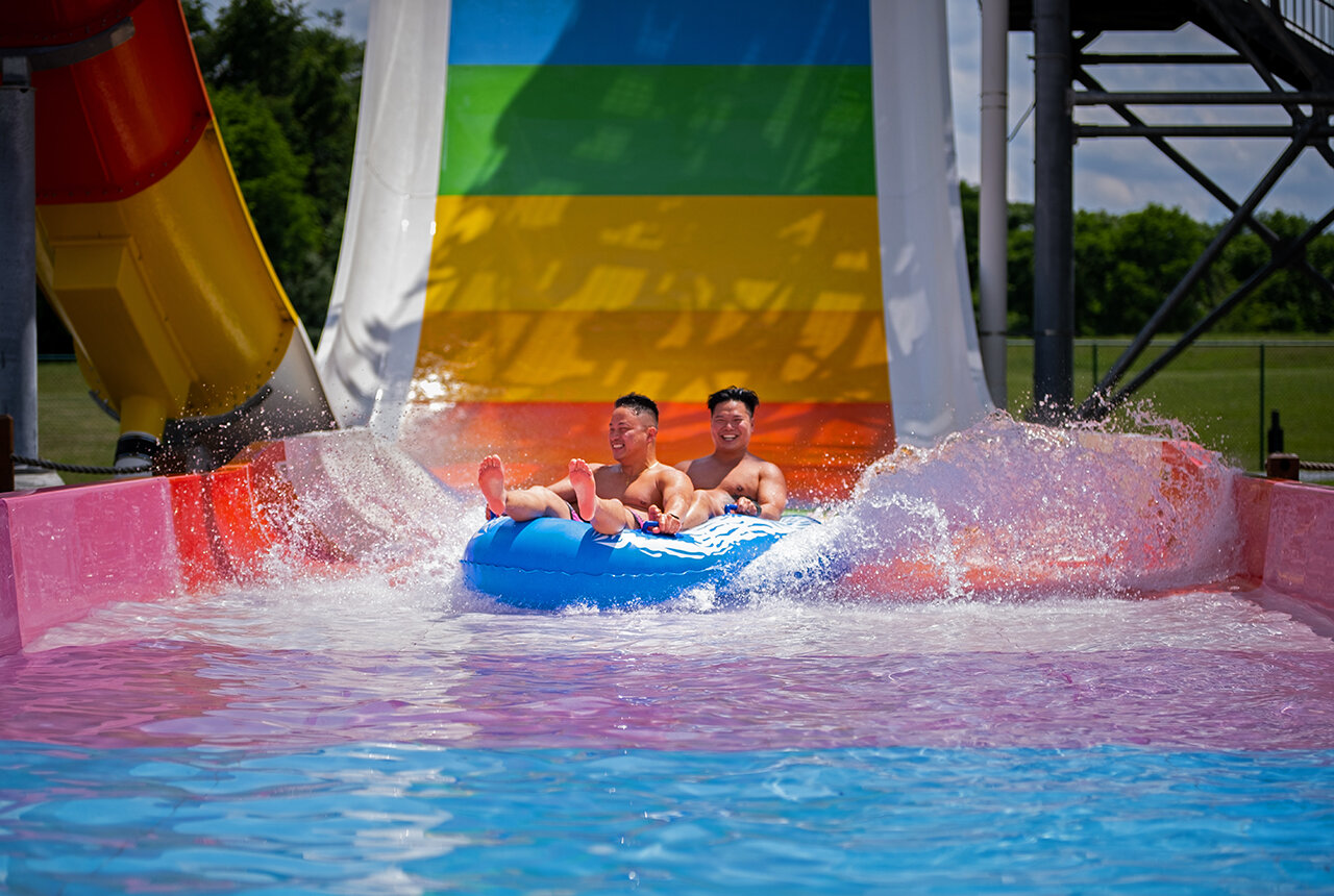 Two men on a waterslide at the Outdoor WaterPark